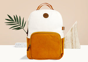 Backpack in blissful curry and shell white.